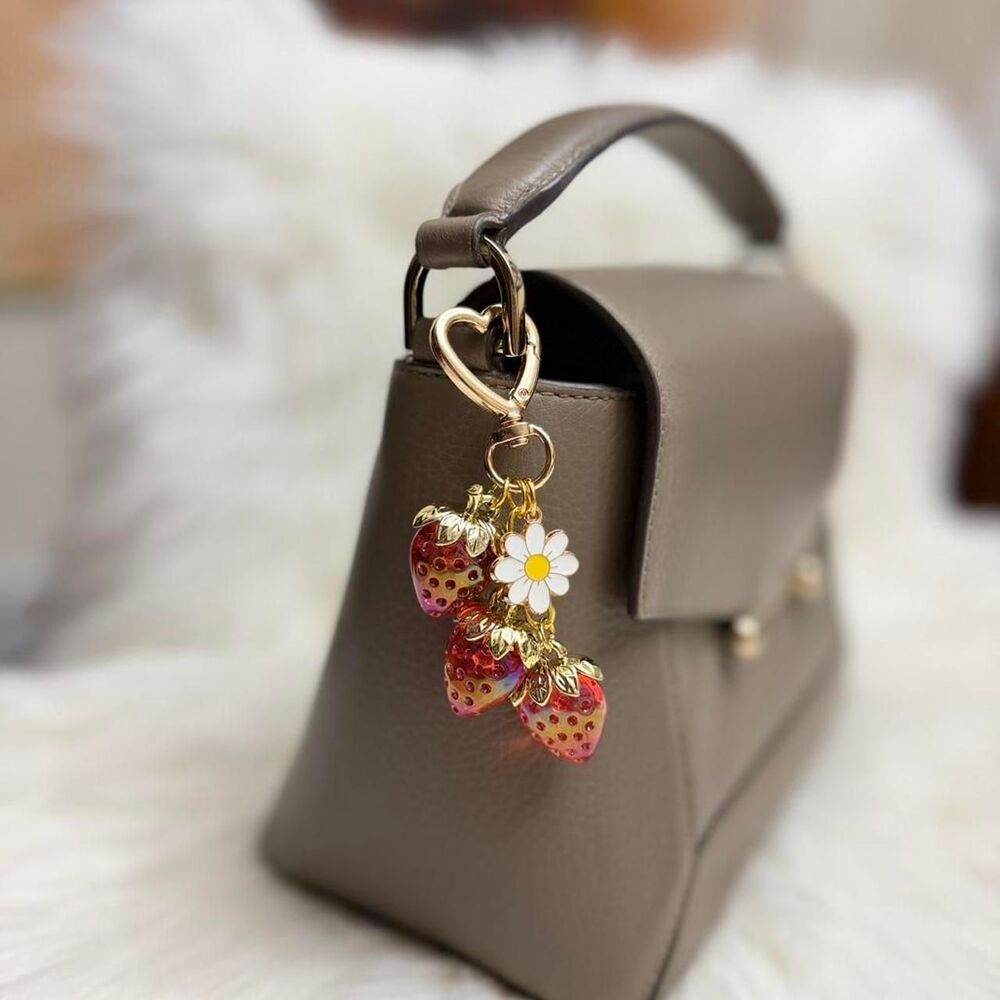 Strawberry keychain with daisy flower charm